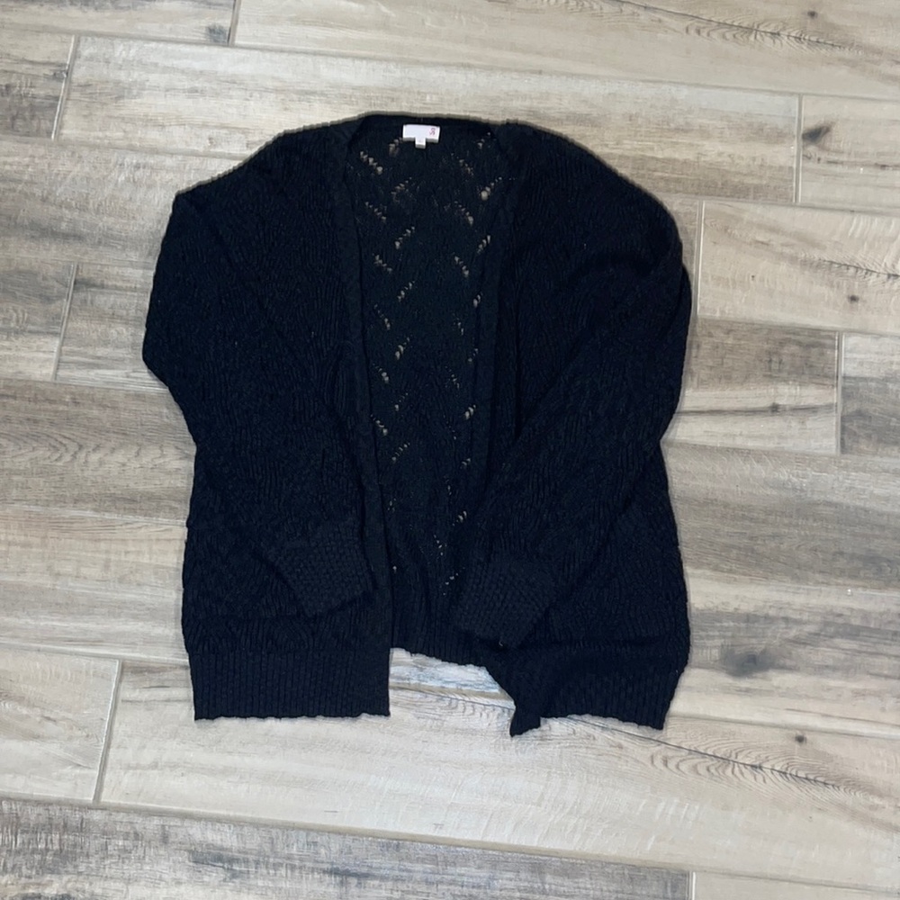 Two SO cardigans. Black and white. Both are in size large.